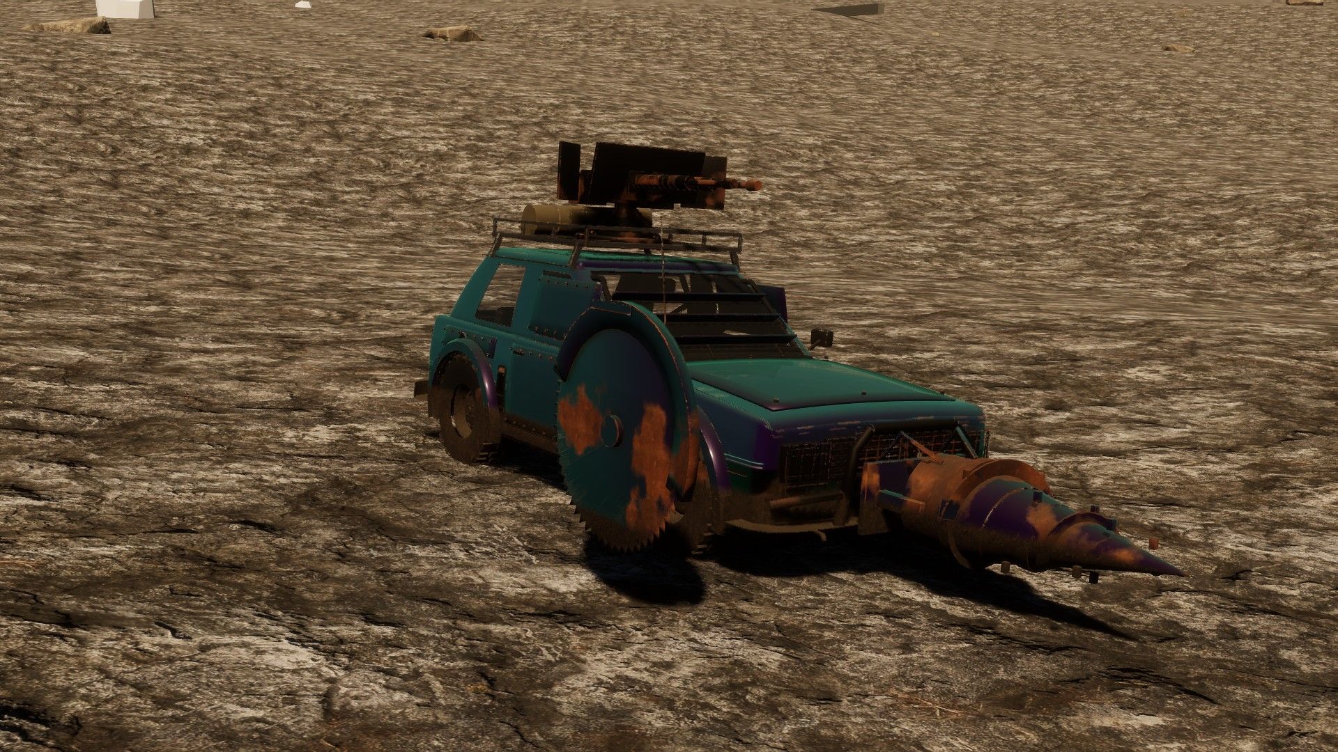 A teal hatchback with a mounted gun and a drill ram, on cracked dry ground